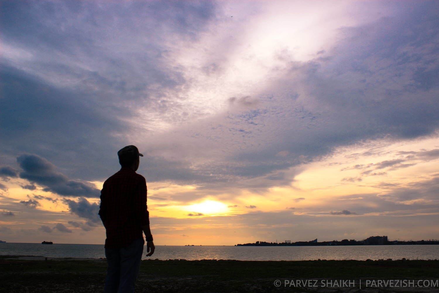 Observing the Sunset from Sand Dunes of Malacca