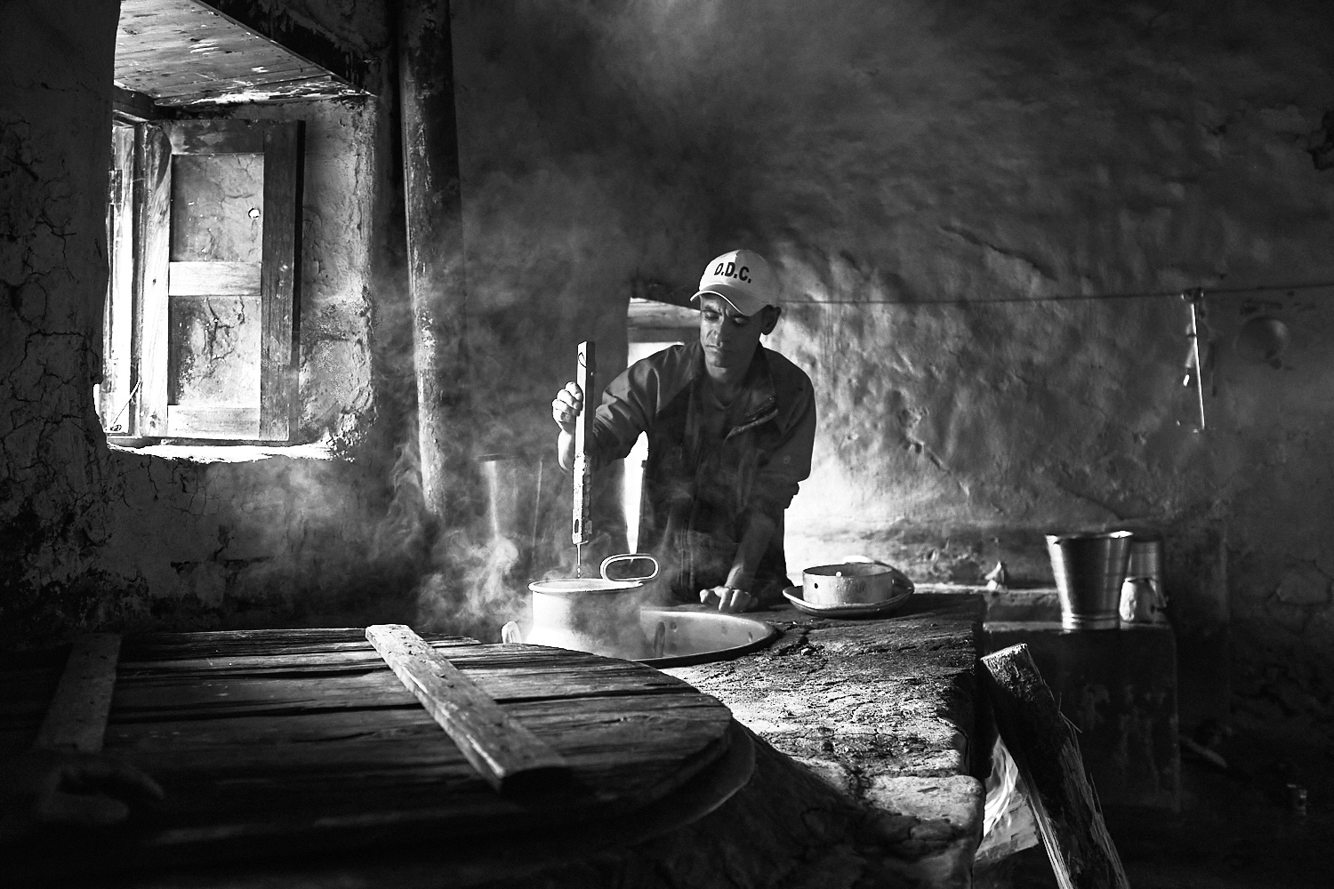 A man working at DDC cheese production centre, Sing Gompa