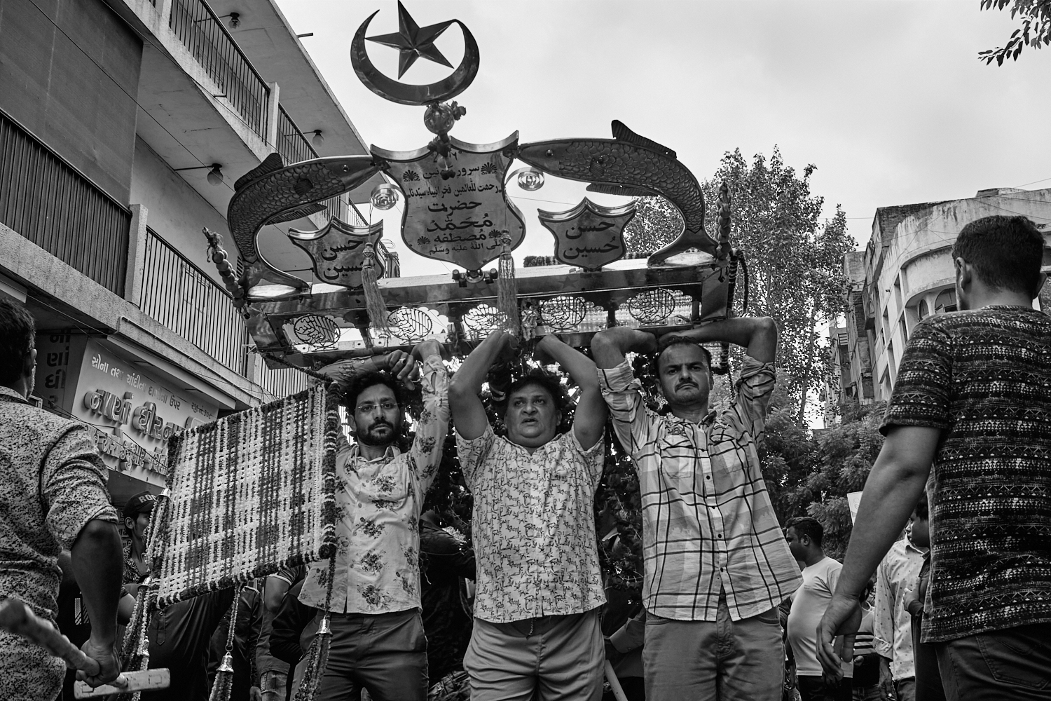 During a tazia procession. Ahmedabad, India. 2023